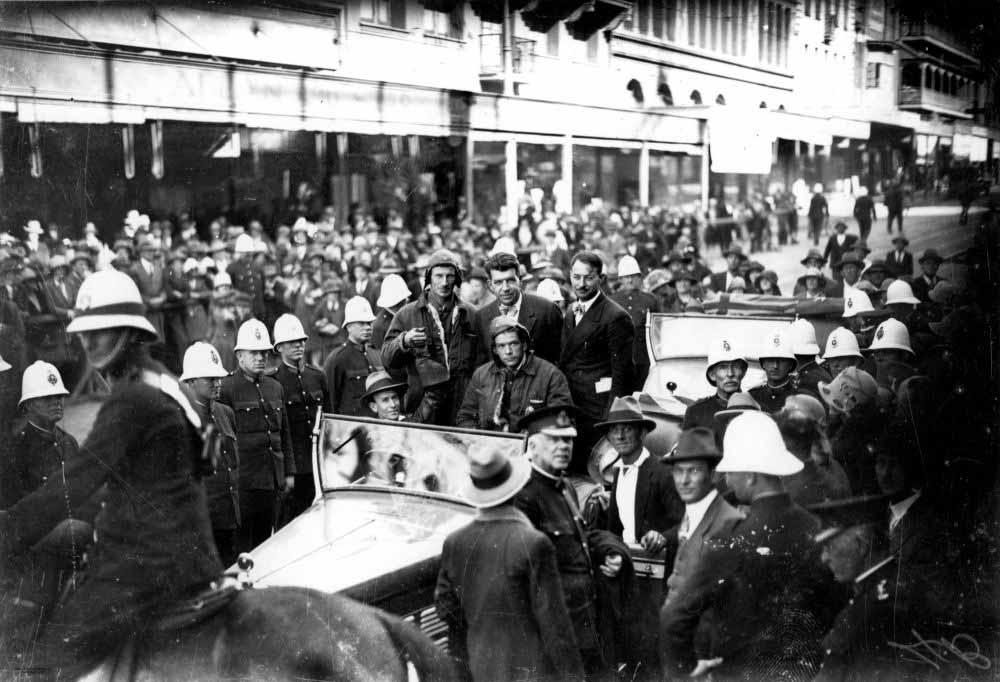 Sir Charles Kingsford Smith lands in Brisbane after completing the first trans-Pacific flight.
